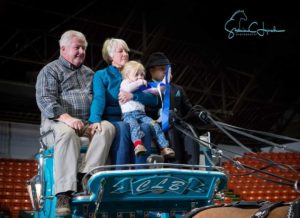 Ted English Hall of Fame Photo Ted on the wagon from 2016 when Country Lane Belgians won the NABC championship.
